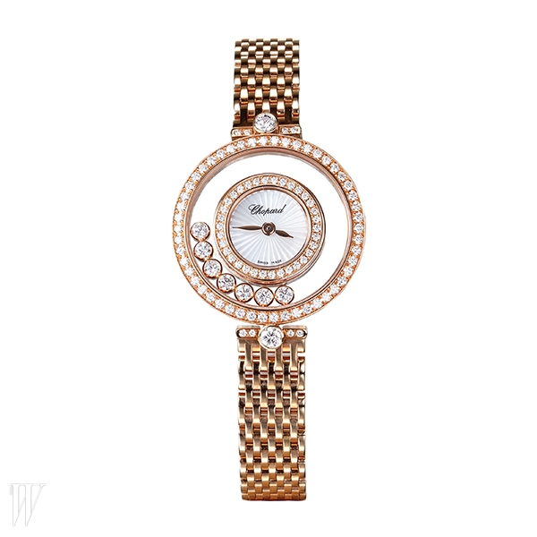 CHOPARD 로즈 골드 케이스 안의 무빙 다이아몬드가 독특한 시계. 4천만원대.