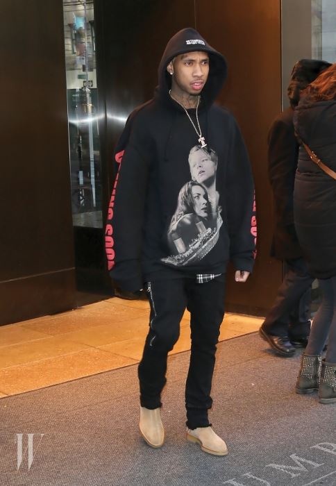 Tyga steps out in New York City wearing a black hoodie with an image of Jack and Rose from 'Titanic'. Pictured: Tyga Ref: SPL1226854 130216 Picture by: Splash News Splash News and Pictures Los Angeles:310-821-2666 New York: 212-619-2666 London: 870-934-2666 photodesk@splashnews.com