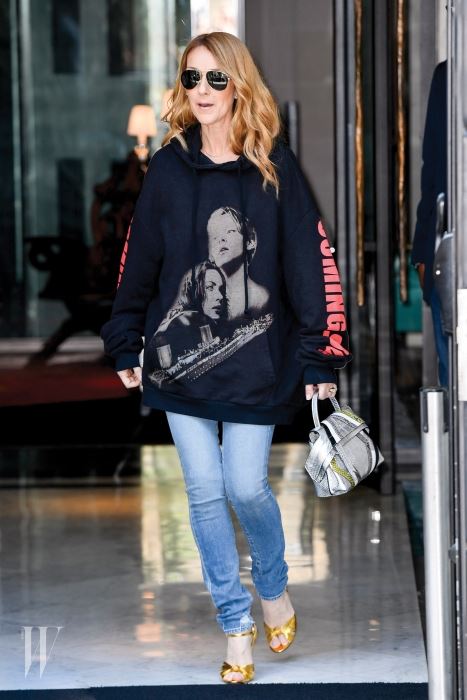 Celine Dion is wearing a large sweaters with Di Caprio and Kate Winslet pictures in effigy of Titanic movie Pecquenard / KCS PRESSE Ref: SPL1315342 080716 Picture by: KCS Presse / Splash News Splash News and Pictures Los Angeles:310-821-2666 New York: 212-619-2666 London: 870-934-2666 photodesk@splashnews.com