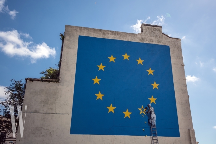 DOVER, ENGLAND - MAY 09:  A recently painted mural by British graffiti artist Banksy, depicting a workman chipping away at one of the stars on a European Union (EU) themed flag is pictured on May 9, 2017 in Dover, England. The work is the latest by Banksy, the anonymous England-based graffiti artist and political activist.  (Photo by Carl Court/Getty Images)