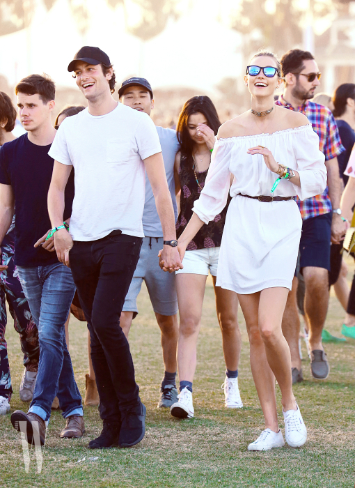 EXCLUSIVE: Karlie Kloss and boyfriend Joshua Kushner are all smiles at Stagecoach in Indio, CA.